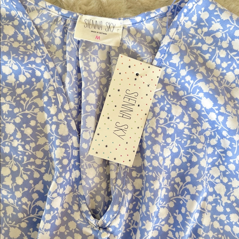 A beautiful chiffon dress, periwinkle blue and white, size medium, brand new!
